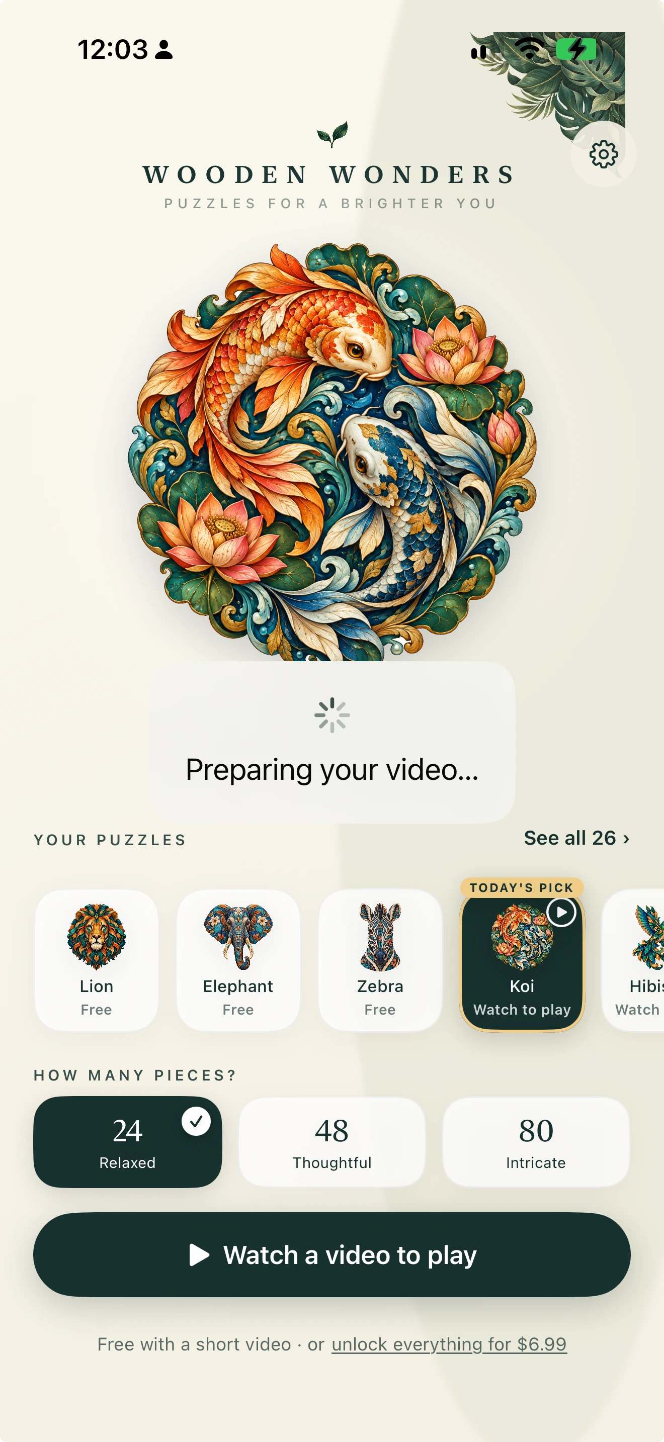 Actual HiddenForm screen showing the koi wooden puzzle, puzzle choices and piece counts, with a Preparing your video message.